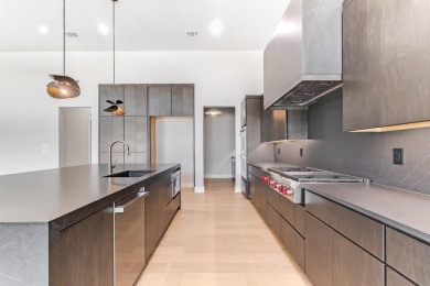 Welcome to 100 Spice Lily, an exceptional new construction home