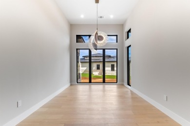 Welcome to 100 Spice Lily, an exceptional new construction home