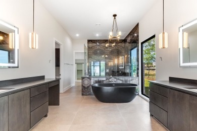 Welcome to 100 Spice Lily, an exceptional new construction home