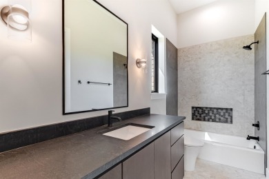 Welcome to 100 Spice Lily, an exceptional new construction home