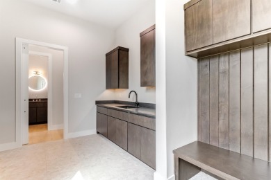 Welcome to 100 Spice Lily, an exceptional new construction home