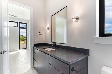 Welcome to 100 Spice Lily, an exceptional new construction home