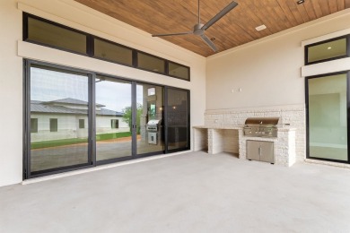 Welcome to 100 Spice Lily, an exceptional new construction home