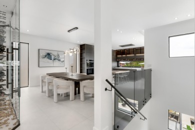 A modern sanctuary on the water, this newly built Key Largo