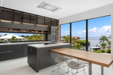 A modern sanctuary on the water, this newly built Key Largo