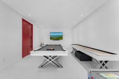 A modern sanctuary on the water, this newly built Key Largo