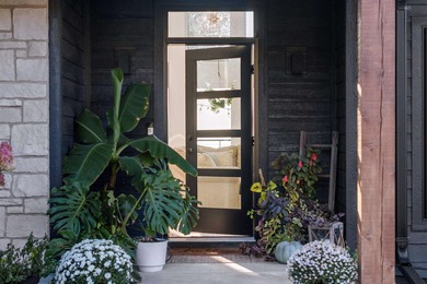 Experience modern-luxury lakeside living in this stunning home