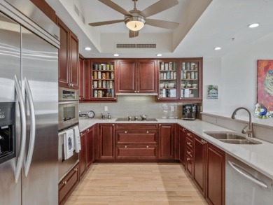 Experience refined coastal living in this elegant residence at