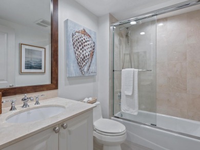 Experience refined coastal living in this elegant residence at