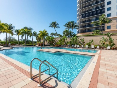 Experience refined coastal living in this elegant residence at