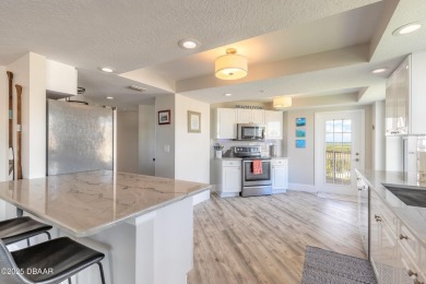 Resort Style Living Everyday in this immaculately remodeled