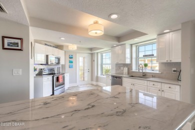 Resort Style Living Everyday in this immaculately remodeled