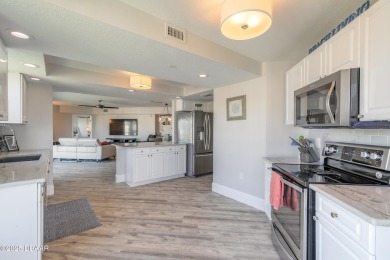 Resort Style Living Everyday in this immaculately remodeled