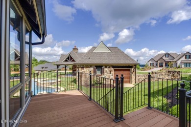 Spacious Tudor-Style Lakefront Home in Gated Golf Community Step