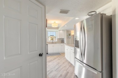 Resort Style Living Everyday in this immaculately remodeled