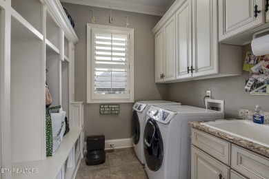 Spacious Tudor-Style Lakefront Home in Gated Golf Community Step