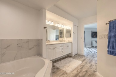 Resort Style Living Everyday in this immaculately remodeled