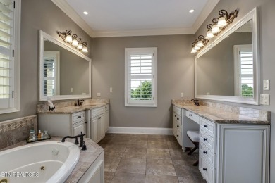 Spacious Tudor-Style Lakefront Home in Gated Golf Community Step