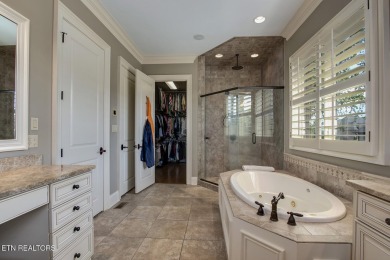 Spacious Tudor-Style Lakefront Home in Gated Golf Community Step