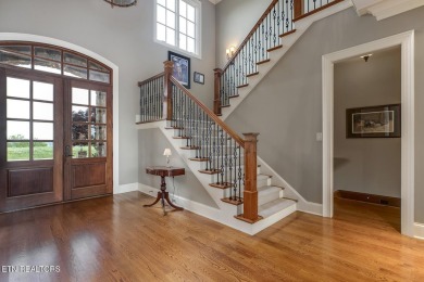 Spacious Tudor-Style Lakefront Home in Gated Golf Community Step
