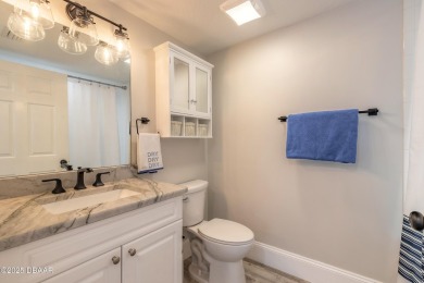 Resort Style Living Everyday in this immaculately remodeled