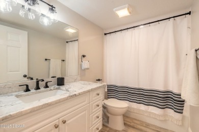 Resort Style Living Everyday in this immaculately remodeled