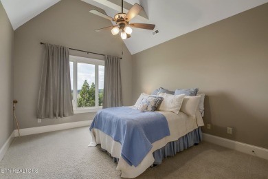 Spacious Tudor-Style Lakefront Home in Gated Golf Community Step