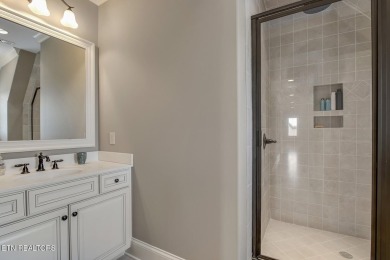 Spacious Tudor-Style Lakefront Home in Gated Golf Community Step