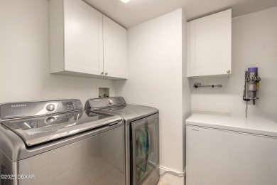 Resort Style Living Everyday in this immaculately remodeled