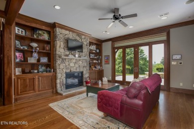 Spacious Tudor-Style Lakefront Home in Gated Golf Community Step