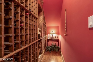 Spacious Tudor-Style Lakefront Home in Gated Golf Community Step