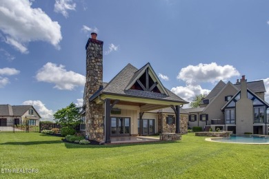 Spacious Tudor-Style Lakefront Home in Gated Golf Community Step