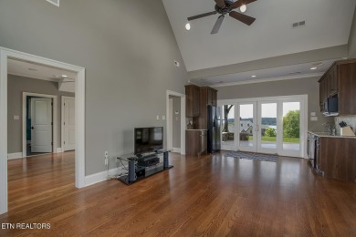 Spacious Tudor-Style Lakefront Home in Gated Golf Community Step