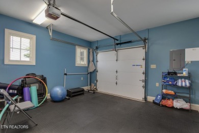 Spacious Tudor-Style Lakefront Home in Gated Golf Community Step