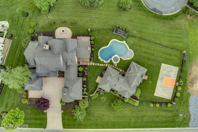 Spacious Tudor-Style Lakefront Home in Gated Golf Community Step