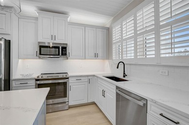 Stunning never-lived-in model home on one of the largest lots in