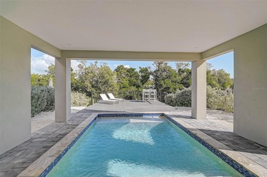 Stunning never-lived-in model home on one of the largest lots in