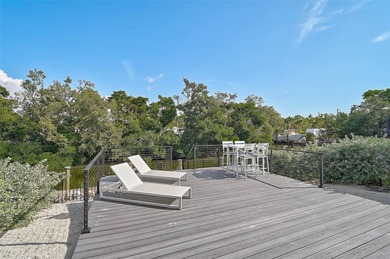 Stunning never-lived-in model home on one of the largest lots in