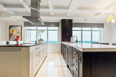 Experience the pinnacle of oceanfront luxury in this trophy