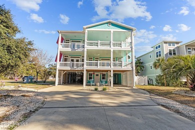 PRICED WELL BELOW APPRAISED VALUE! WELCOME TO COASTAL LUXURY AT