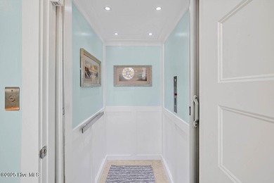 PRICED WELL BELOW APPRAISED VALUE! WELCOME TO COASTAL LUXURY AT