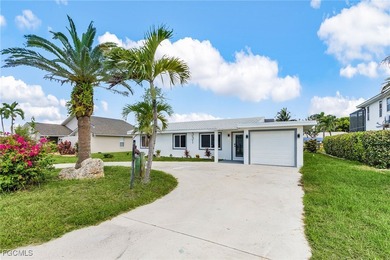 LOCATION LOCATION! Gulf Access Gem on Fort Myers Beach!