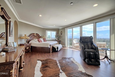 Experience elevated coastal living at its finest from this