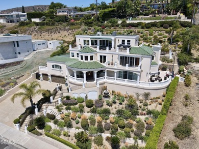 Experience elevated coastal living at its finest from this