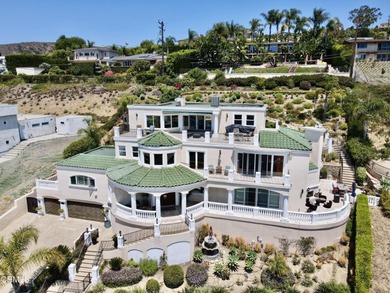 Experience elevated coastal living at its finest from this