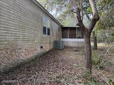 High and dry acreage, quiet natural surroundings, frontage on