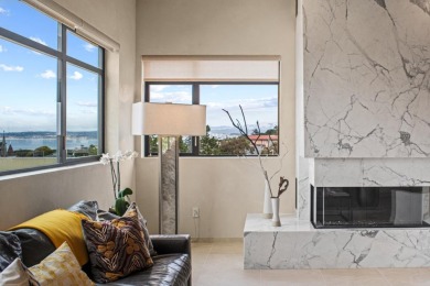 Modern elegance meets coastal charm in this stunning penthouse