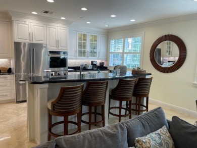 Stunning 3-story corner townhouse with private elevator in