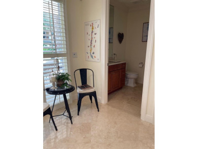 Stunning 3-story corner townhouse with private elevator in