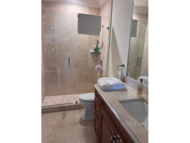 Stunning 3-story corner townhouse with private elevator in